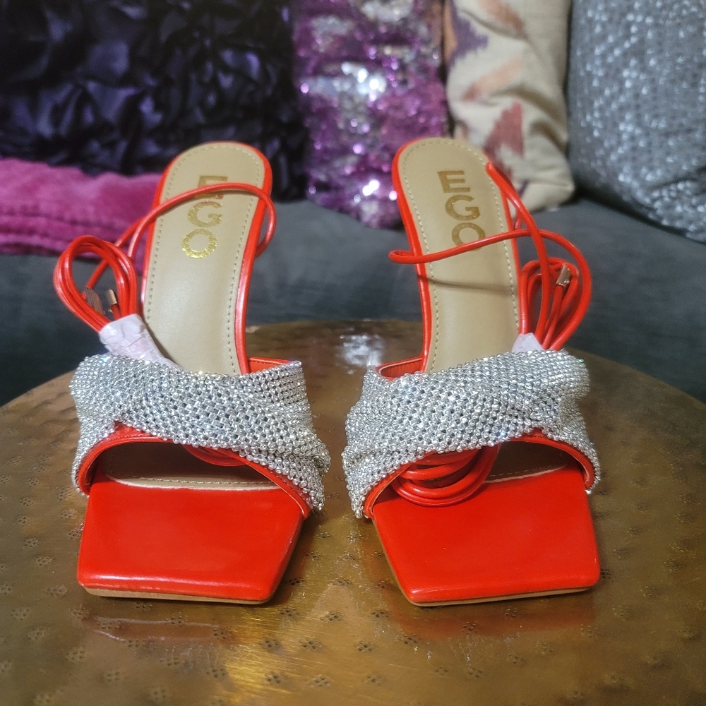 Red string up embellished heels